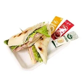 Santa Bárbara Sandwich, with ham, vegetables, and a variety of sauces. islagrande.com